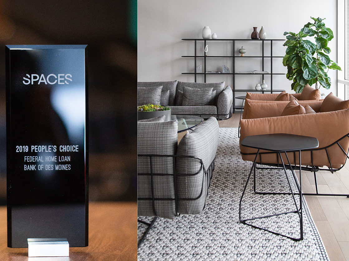 Lounge setting within Federal Home Loan Bank next to 2019 Spaces People's Choice Award.